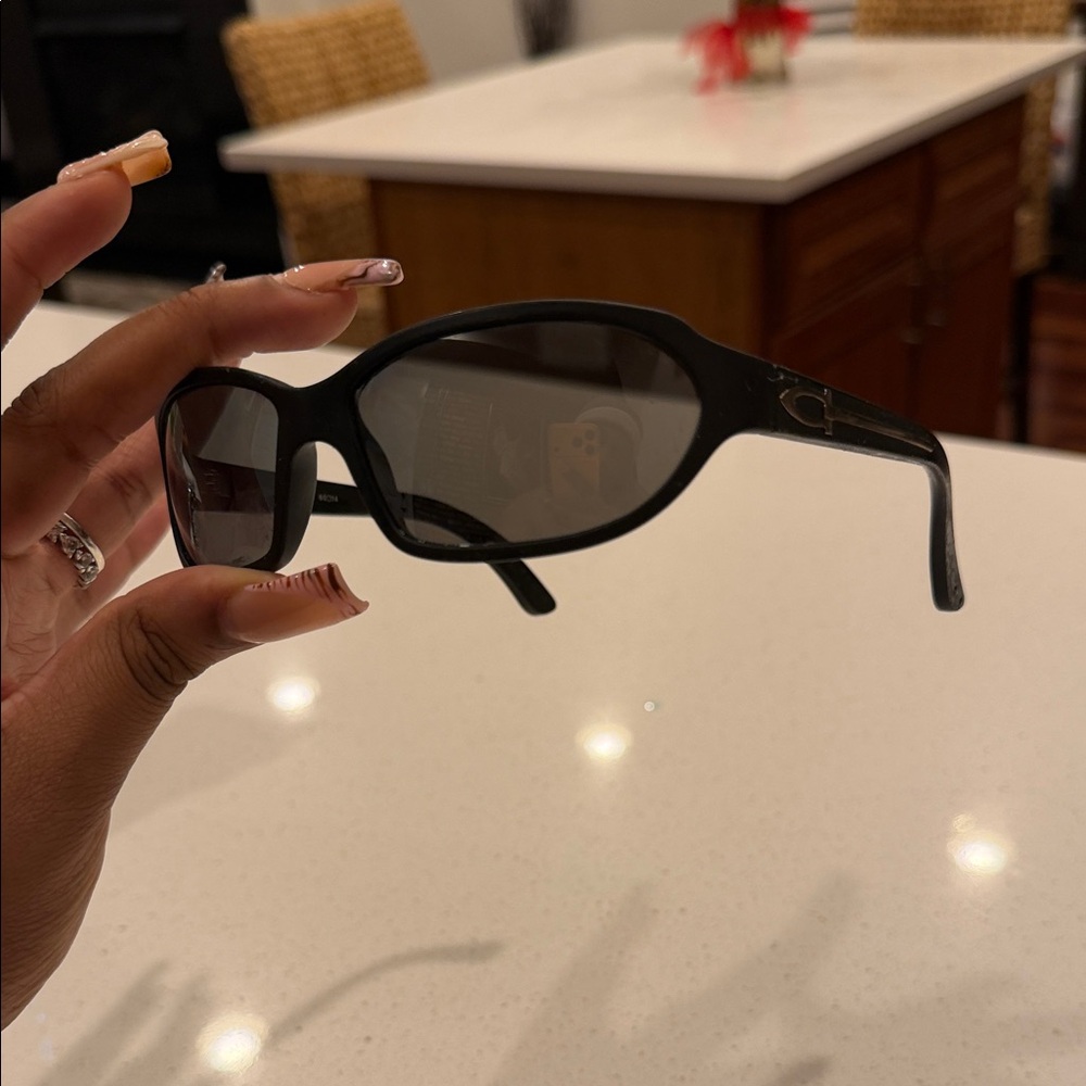 Cartier Black and Gold Sunglasses